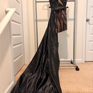 Elegant Black and Tan Gown with Train